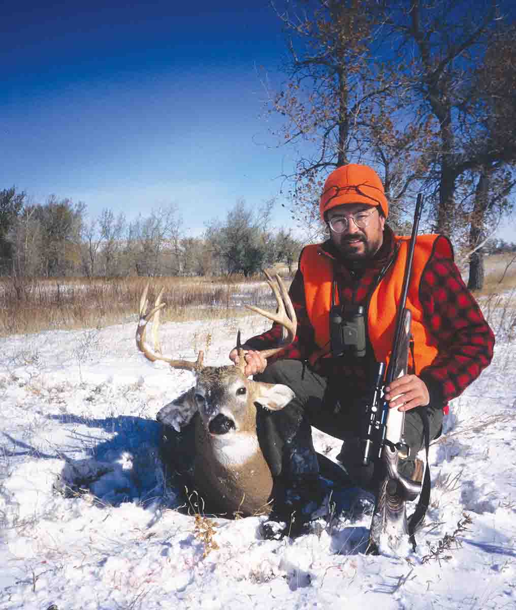 The 7mm Remington Magnum works very well as an all-around cartridge for both deer and larger game. John shot this whitetail buck in 1991 with a Browning A-Bolt.